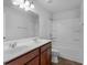 Bathroom with double sinks, tile floors, and a shower-tub combination at 505 Mariposa Ln, Mcdonough, GA 30253