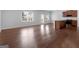 Spacious living room with hardwood floors, lots of light and an open floor plan at 505 Mariposa Ln, Mcdonough, GA 30253