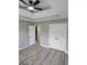 Bedroom featuring a ceiling fan and wood floors at 2587 Mead Ct, Jonesboro, GA 30236