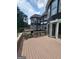 Expansive wooden deck with stairs offers outdoor living space with views of the backyard and home at 2587 Mead Ct, Jonesboro, GA 30236