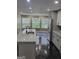 Modern kitchen with stainless steel appliances, granite countertops, and ample cabinet space at 2587 Mead Ct, Jonesboro, GA 30236