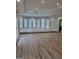 Spacious living room with recessed lighting, wood flooring, and lots of windows at 2587 Mead Ct, Jonesboro, GA 30236