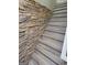 The staircase has gray wood-look floors and a stone accent wall at 2587 Mead Ct, Jonesboro, GA 30236