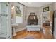 Elegant bathroom with a clawfoot tub, shower, and fireplace, creating a luxurious spa-like experience at 53 Born St, Norcross, GA 30071