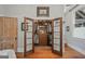 Walk-in closet with wood floors and shelving, offering plenty of space for storage and organization at 53 Born St, Norcross, GA 30071