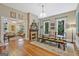 Charming dining room with a fireplace and doorway into living room at 53 Born St, Norcross, GA 30071
