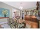 Lovely dining room with seating for eight and a vintage hutch at 53 Born St, Norcross, GA 30071