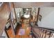 Entryway featuring hardwood floors, bench, console table and staircase at 53 Born St, Norcross, GA 30071