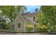 Charming two-story home with a screened-in porch and beautiful landscaping at 53 Born St, Norcross, GA 30071