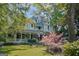 Beautiful two-story home with a welcoming front porch and lush green lawn at 53 Born St, Norcross, GA 30071