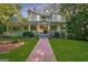 Inviting two-story home with a brick pathway, front porch, and well-maintained lawn at 53 Born St, Norcross, GA 30071