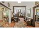 Elegant entryway with hardwood floors, wooden staircase, and decorative furnishings at 53 Born St, Norcross, GA 30071