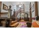 Grand foyer featuring a wooden staircase, detailed trim, and traditional decor at 53 Born St, Norcross, GA 30071