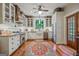 Spacious kitchen with white cabinetry, granite counters, and stainless steel appliances at 53 Born St, Norcross, GA 30071