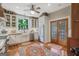 Bright kitchen featuring white cabinets, stainless steel appliances, and a farmhouse sink at 53 Born St, Norcross, GA 30071