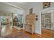 Open living area with hardwood floors, multiple rooms, fireplace and built-ins at 53 Born St, Norcross, GA 30071