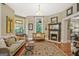 Cozy living room features a fireplace, plush seating, and a beautiful area rug at 53 Born St, Norcross, GA 30071