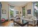 Bright living room with hardwood floors, large windows, and comfortable seating at 53 Born St, Norcross, GA 30071