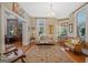 Bright living room with hardwood floors, comfortable seating, and a fireplace at 53 Born St, Norcross, GA 30071