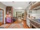 Open living space showcasing dining and living areas, wood floors and built-ins at 53 Born St, Norcross, GA 30071
