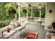 Charming covered porch featuring seating and decorative details, creating a relaxing outdoor space at 53 Born St, Norcross, GA 30071