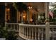 Exterior shot of a covered porch with decorative lighting and comfortable seating arrangements at 53 Born St, Norcross, GA 30071