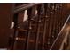 Close up of the stained staircase showing the well crafted banister and treads at 53 Born St, Norcross, GA 30071