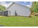 The house's exterior, featuring a fenced patio and a grassy backyard at 470 Cornwallis Way, Fayetteville, GA 30214