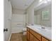 Bathroom features a tub and shower combo, a toilet, and a vanity with a sink at 470 Cornwallis Way, Fayetteville, GA 30214