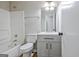 Bathroom features updated vanity, mirror, and shower-tub combination at 470 Cornwallis Way, Fayetteville, GA 30214