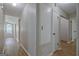 Hallway featuring wood flooring and neutral paint at 470 Cornwallis Way, Fayetteville, GA 30214