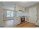 Modern kitchen with stainless steel appliances and granite countertop at 470 Cornwallis Way, Fayetteville, GA 30214