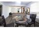 Open dining area with modern furniture, a view to the living room, and ample natural light at 1112 Mealor Rd, Lawrenceville, GA 30043