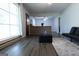Inviting living room features a large window, comfortable seating, and modern decor at 1112 Mealor Rd, Lawrenceville, GA 30043