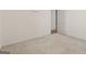Neutral bedroom with light-colored carpet and door leading into another room at 377 Avian Forest Dr, Stockbridge, GA 30281