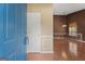 Inviting foyer with beautiful wood floors leads into a spacious living area at 377 Avian Forest Dr, Stockbridge, GA 30281