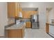 Well-equipped kitchen featuring stainless steel appliances and ample counter space at 377 Avian Forest Dr, Stockbridge, GA 30281