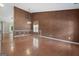 Spacious living room with hardwood floors, decorative molding, and natural light at 377 Avian Forest Dr, Stockbridge, GA 30281