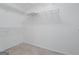Spacious walk-in closet with carpet and multiple shelves to keep your clothes and accessories organized at 377 Avian Forest Dr, Stockbridge, GA 30281