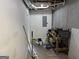 Unfinished basement area with concrete flooring, exposed pipes, and a workbench at 51 Estates Dr, Villa Rica, GA 30180