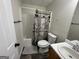 Full bath featuring modern fixtures and decorative shower curtain, adding style at 51 Estates Dr, Villa Rica, GA 30180