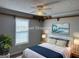 Nicely staged bedroom with coastal artwork on the walls at 51 Estates Dr, Villa Rica, GA 30180