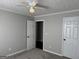 Comfortable bedroom features soft carpeting, neutral walls, and a closet, providing a serene retreat at 51 Estates Dr, Villa Rica, GA 30180