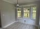 Cozy breakfast nook with a bay window providing abundant natural light and views of the backyard at 51 Estates Dr, Villa Rica, GA 30180