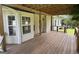 Exterior view of a house's deck with wood floors and rails at 51 Estates Dr, Villa Rica, GA 30180