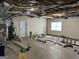 Spacious garage with overhead storage and open ceiling at 51 Estates Dr, Villa Rica, GA 30180