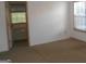 Bedroom with neutral tones, carpet, and a window providing ample natural light at 3336 Harvester Woods Rd, Decatur, GA 30034