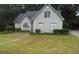 Charming home with a manicured lawn and traditional architectural details at 3336 Harvester Woods Rd, Decatur, GA 30034