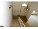 Traditional staircase with carpet and classic railing leading to upper floors at 3336 Harvester Woods Rd, Decatur, GA 30034