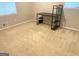 Basement area with neutral carpet, a desk and natural light at 10178 Top Tree Ct, Jonesboro, GA 30238